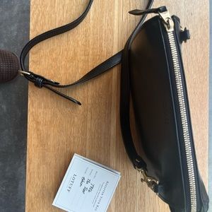 Lotuff Tripp in black - used condition